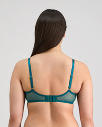 Model wears Lottie Underwire Bra in EVERGLADE. On body back view