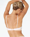 Model wears Nikki Wire Free Bra in SPANISH VILLA/WHITE. On body back view