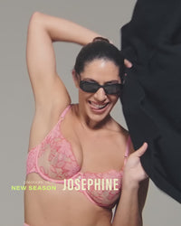 model-poses-in-pink-embroidered-lingerie-set