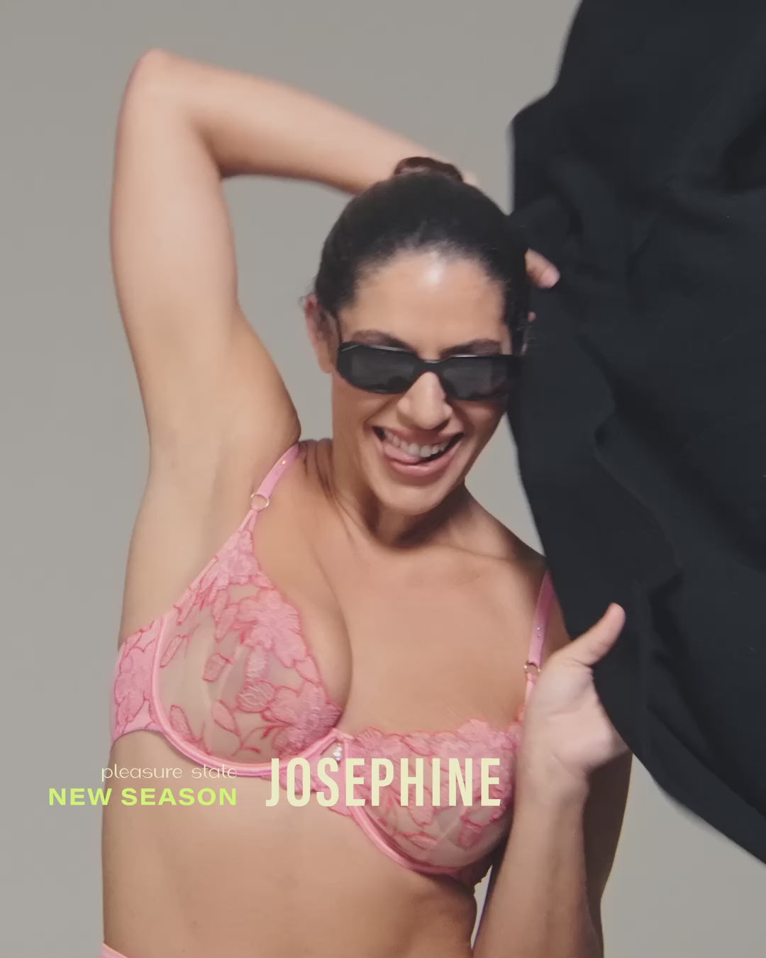 model-poses-in-pink-embroidered-lingerie-set