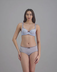 model-poses-in-light-blue-lingerie-set