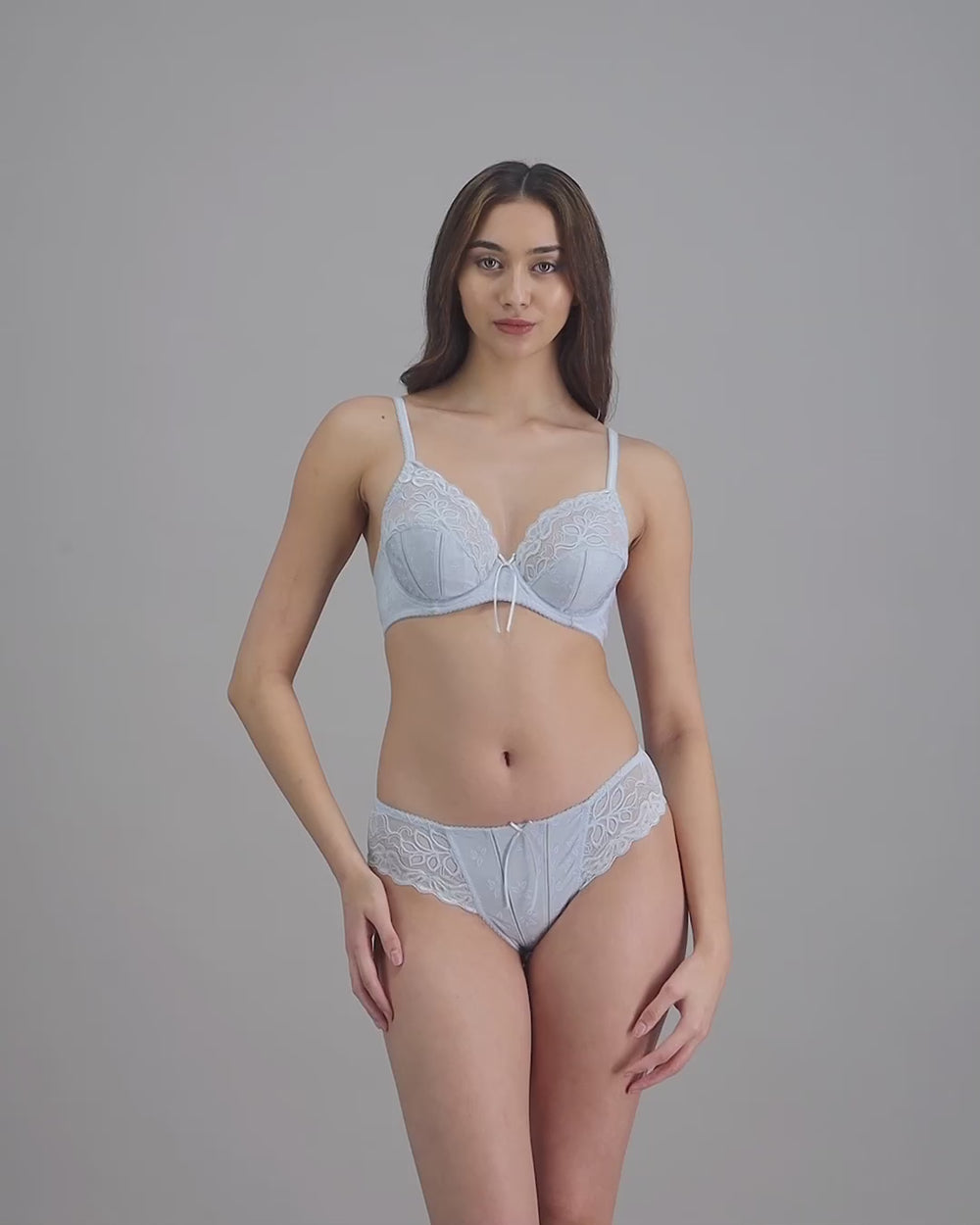 model-poses-in-light-blue-lingerie-set