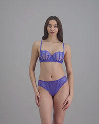 model-poses-in-dazzling-blue-lingerie-set