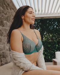 model squeezes lemon into water glass wearing coco divine lingerie set