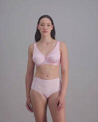 model-poses-in-light-pink-bra-and-underwear-set
